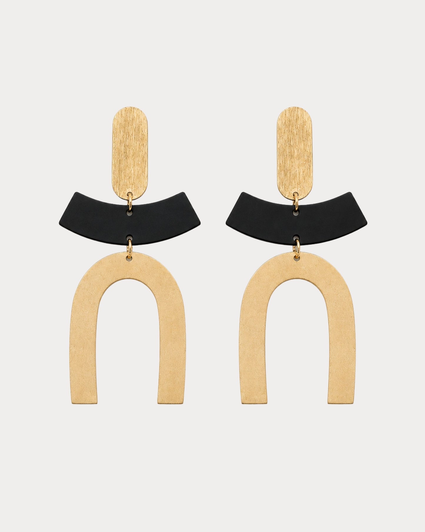 Close-up detail of The Dana black and gold Japanese-inspired statement earrings — Olivia Holland